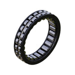 A 3D rendering of an Onyx Sprag Clutch showcases the product's precision, featuring outer and inner rings with rows of cylindrical rollers between them.