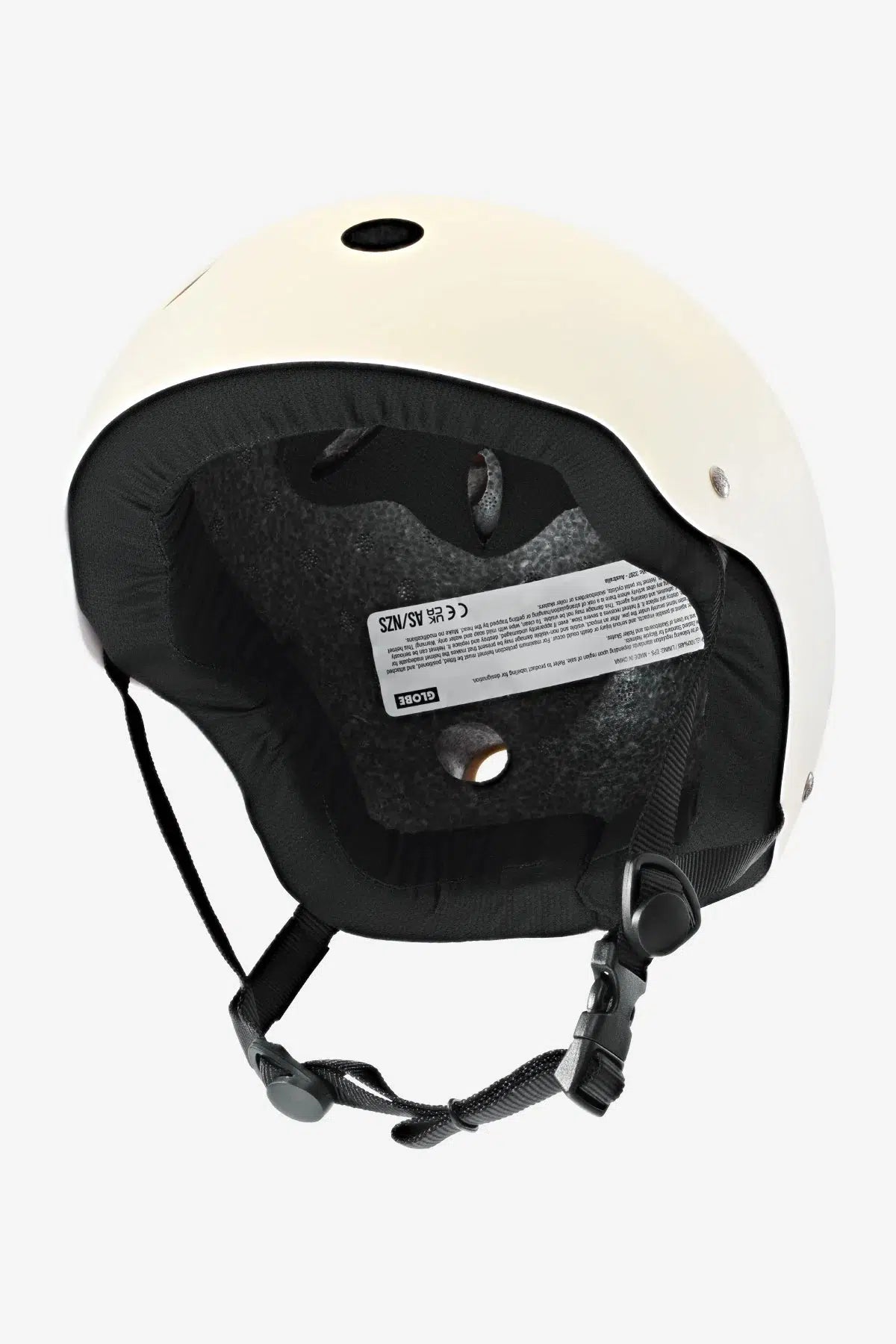 A Goodstock Certified Helmet / Matte Off-White with black interior padding, an adjustable chin strap, EPS foam for added protection, and a label inside showing safety certifications.