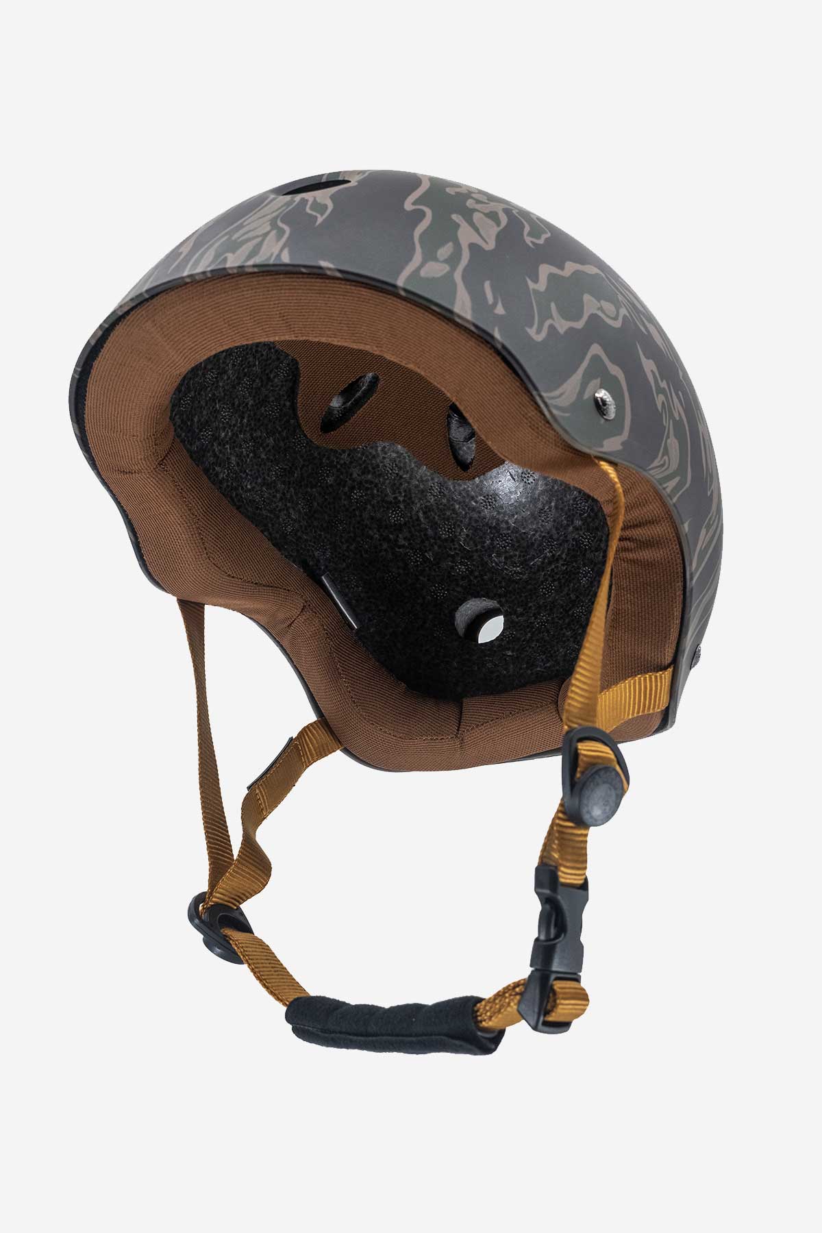 A Goodstock Certified Helmet / Tiger Camo with a camouflage pattern, brown straps, and a black buckle, featuring high impact protection and a CoolMax liner for comfort, shown from a side angle.