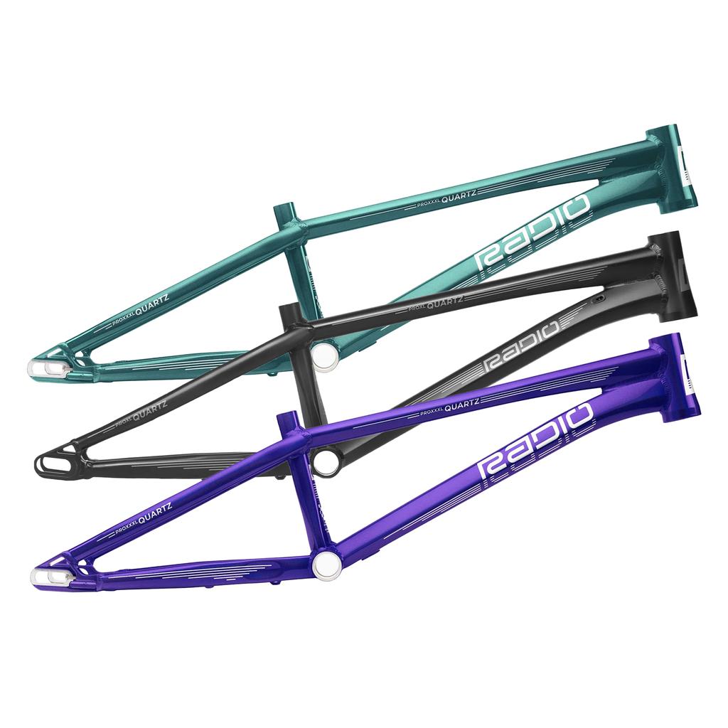 Three Radio Raceline Quartz 2025 Pro XL Frames are arranged diagonally in teal, black, and purple. Each frame features a Sliding Dropout Disc System for optimal performance and style.