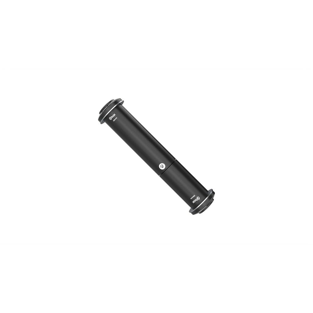 The Box One 20mm Thru-Bolt Adjustable 105mm to 130mm, a black cylindrical tool with a labeled scale and connecting joints at both ends, is perfect for optimizing your BMX racing setup. Whether you're using the adjustable axle or 20mm through hubs, this tool ensures precision and performance.