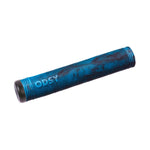 Close-up of a blue and black ribbed cylindrical object with "ODSY" embossed on it, likely the Odyssey Broc Raiford Grips, which are signature BMX grips.