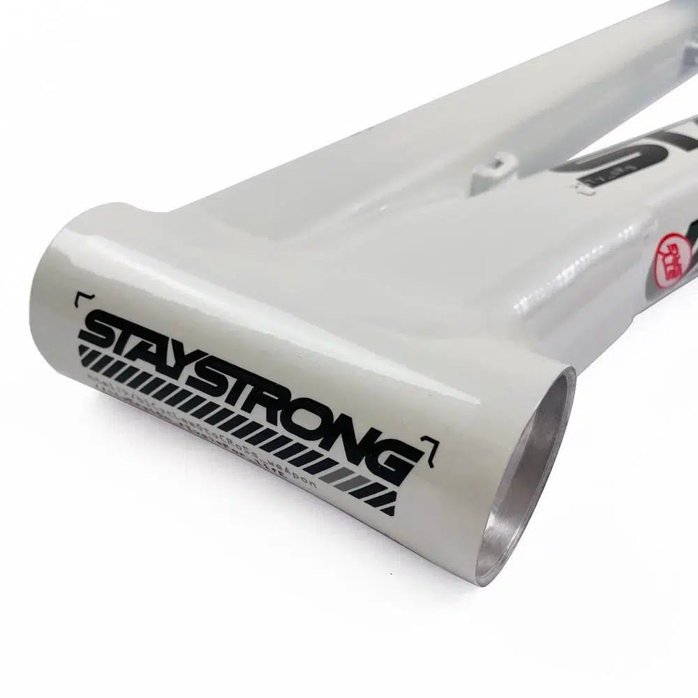 Close-up of a white aluminum race frame with "Staystrong V5 Disc Mini Frame" printed in black letters near the head tube junction.