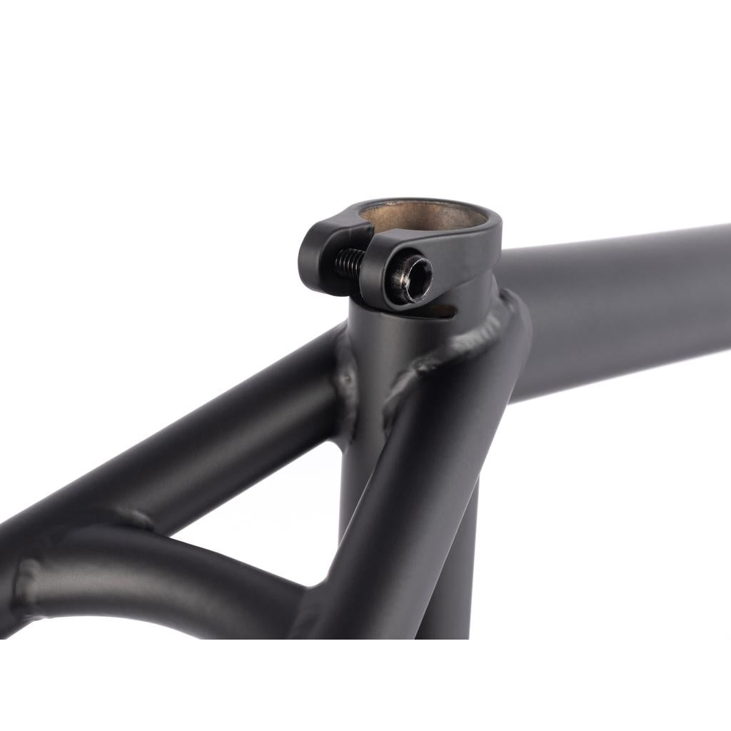 Close-up of the seat clamp area on the BSD Soulja V4 Frame (2022) in black, highlighting visible welds, a bolt, and built-in chain tensioners.