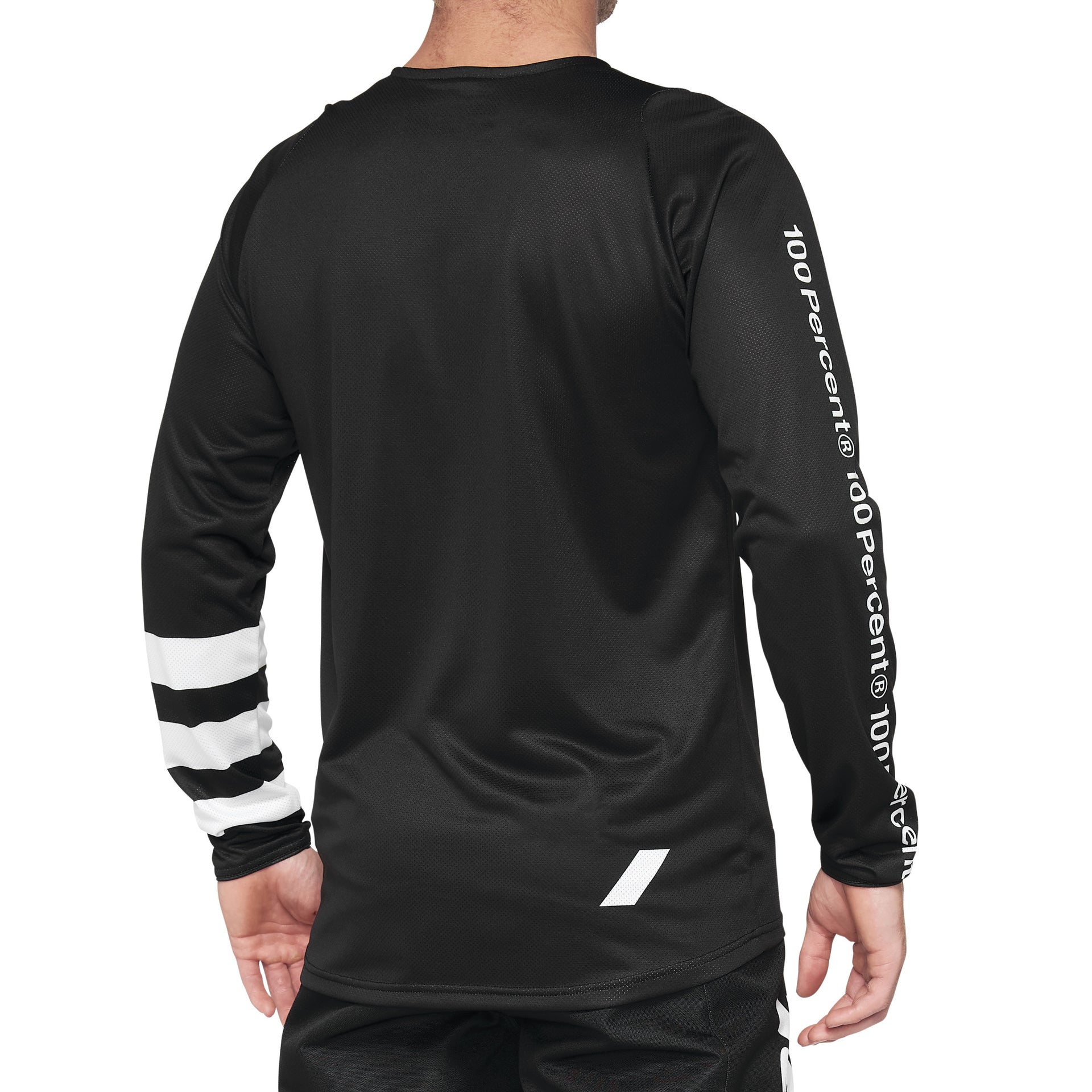 Person wearing the 100% R-Core Youth Jersey in black, highlighted by white text on the sleeve, ideal for moisture management and featuring fade-resistant graphics.