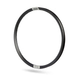 The Pride Helium Brakeless Cruiser Rim is a sleek black bicycle rim made from premium aluminum, complete with a white label and evenly spaced holes around its edge. It's perfect for a 24-inch cruiser setup or disc configuration.