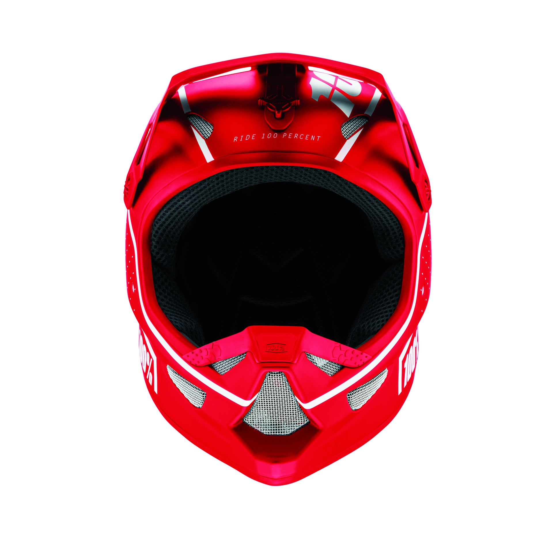 Top view of a bright red 100% Status Helmet Dreamflow Red with black interior padding, displaying the words "Ride 100 Percent" inside the top. This full face protection gear also comes in youth sizes for younger riders.