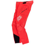 The TLD 25.1 Sprint Pant in Mono Fiery Red is designed with black accents, a small upper leg logo, a zip pocket, and perforated ventilation. Race-ready and crafted from durable materials for every curve and jump.