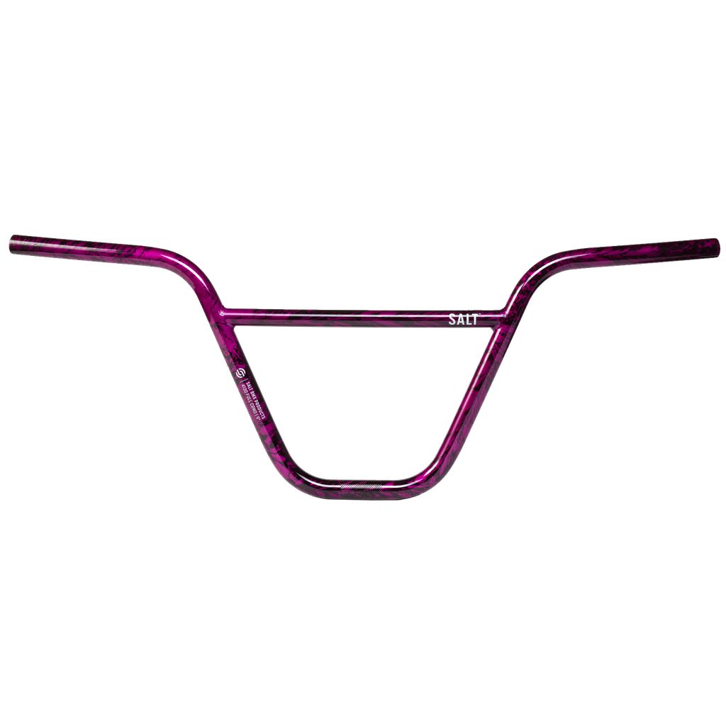 A Salt Pro Bars handlebar with a seamless Chromoly build featuring a purple and black mottled design and the brand name "SALT" printed on it.