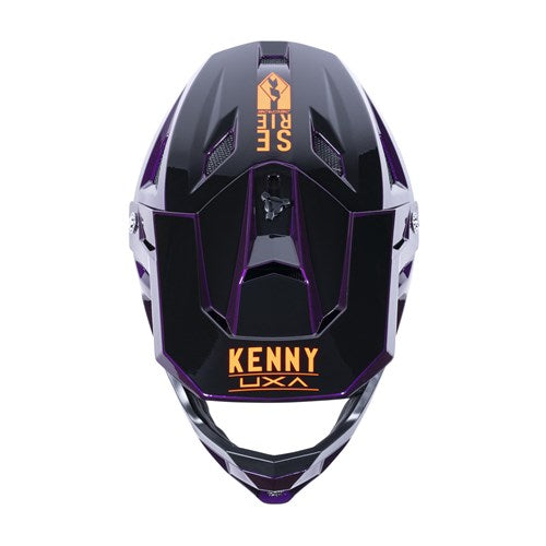 Top view of a Kenny Racing Decade Full Face Helmet in Candy Purple with orange "Kenny" and "See Rise" text, featuring an adjustable padded chin strap.