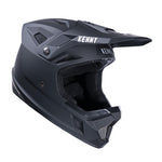 The Kenny Racing Decade Full Face Helmet in Matte Black boasts an angular design with a visor and brand logo on the top front. Enhanced with MIPS technology, it offers superior protection for every ride.