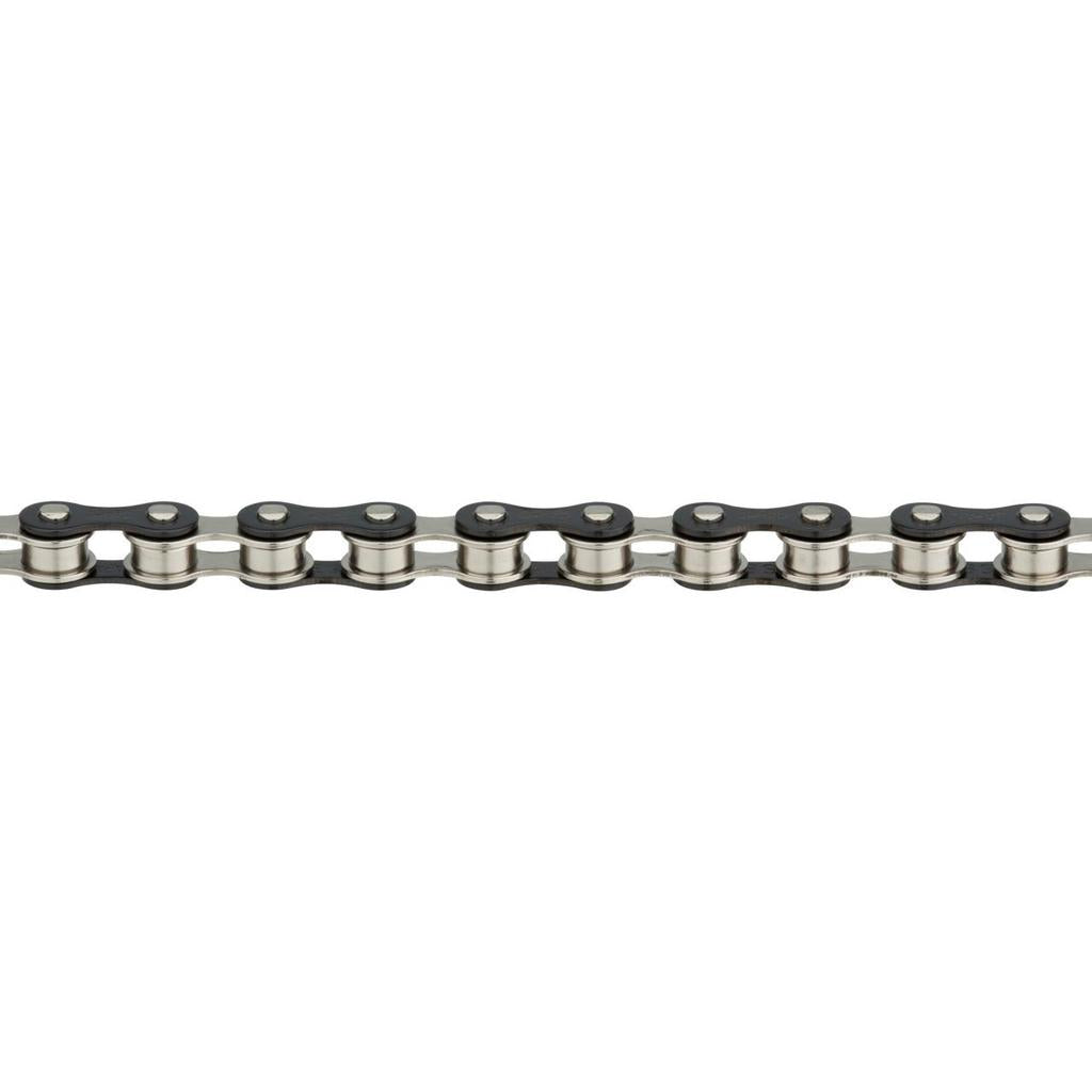 The Izumi 1/2 x 1/8 Chain features alternating silver and black components, showcasing visible links and pins against a plain white background, highlighting the precision of Japanese craftsmanship.