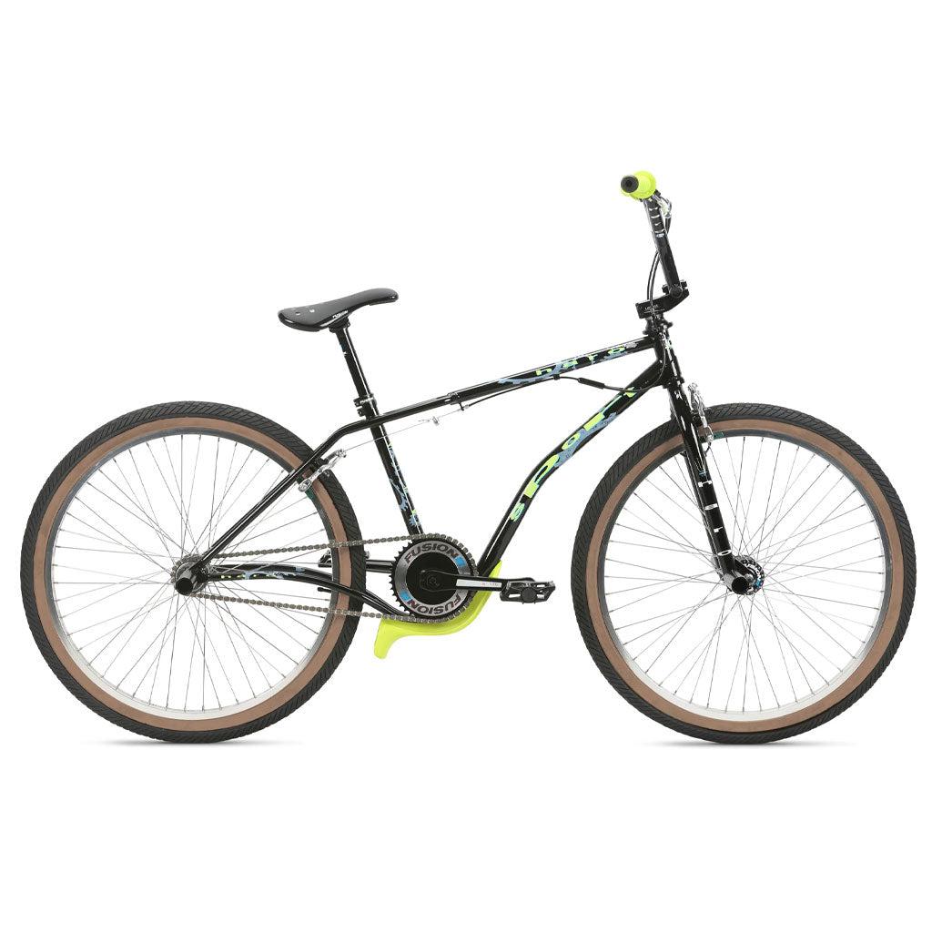 The Haro Lineage Sport Freestyler Bashguard 26 Inch Bike is a BMX bike with a black and green color scheme, yellow handle grips, a yellow pedal crank, large brown tires, a single-speed gear system, and a durable chromoly frame.