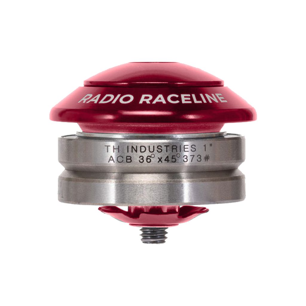 A red and silver mechanical component labeled "RADIO RACELINE" on the top and "TH INDUSTRIES 1" ACB 36 x 45° 373#" on the side, featuring a screw protruding from the bottom. This lightweight CNC machined piece incorporates high-precision bearings for optimal performance. The Radio Raceline 1-Inch Integrated Headset is integral to enhancing your bike's precision and functionality.