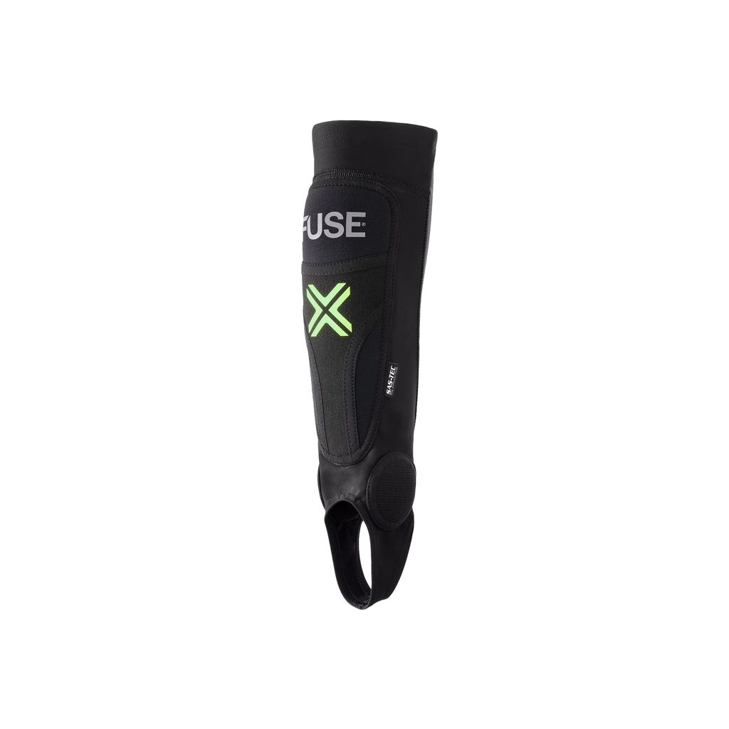 The Fuse Omega Pro Shin/Ankle Combo Pads in black and green are equipped with SAS-TEC inserts for superior protection, include a foot strap, and prominently display the "FUSE" branding.