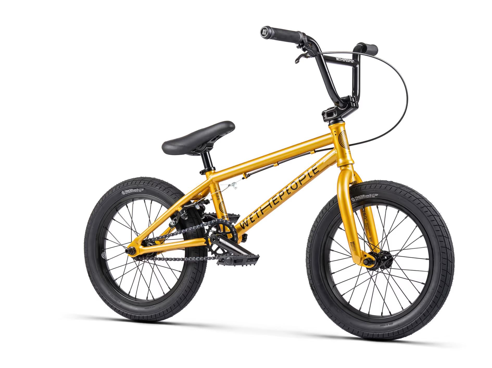 The Wethepeople Seed 16 Inch Bike is a yellow BMX designed for young riders, featuring a black seat and handlebars with thick tires.