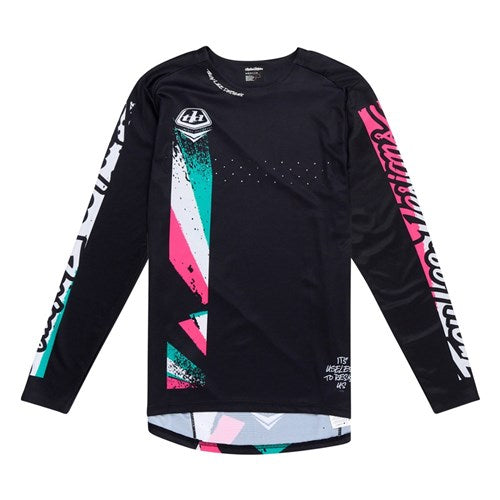 The TLD 25.1 Sprint Jersey / Full Pull Black, a long-sleeve jersey with abstract pink, teal, and white graphics plus text accents on the sleeves and chest, is perfect for race weekends.