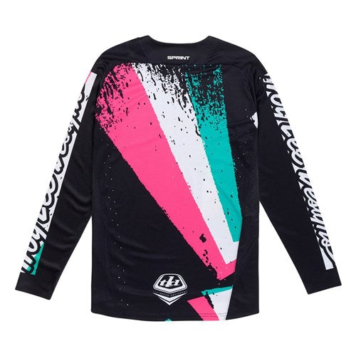 The TLD 25.1 Sprint Jersey / Full Pull Black features a vibrant pink, teal, and white abstract back design perfect for racing weekends. It includes a logo on the lower back and detailed sleeve patterns, drawing inspiration from both Sprint Jersey and Troy Lee jerseys.