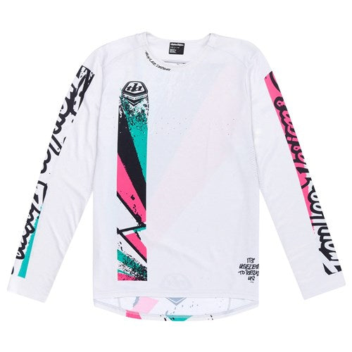 The TLD 25.1 Sprint Jersey, Full Pull Chalk, is a white long-sleeve with pink, teal, and black abstract sleeves and front. Ideal for race weekends, it showcases text and graphics inspired by Troy Lee Designs.