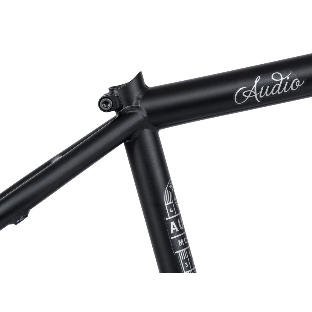 Close-up of the Wethepeople Audio 22 Inch Frame labeled "Audio" near the seatpost junction and "AU" with additional text on the seat tube.