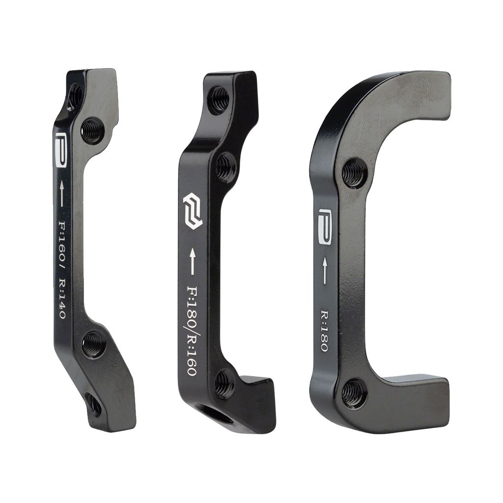 Three black Promax PM for IS aluminium alloy adaptors with white branding and size labels: F160/R140, F180/R160, R180. Designed for post mount disc brake calipers with a 140mm rotor, they ensure precision in every ride.