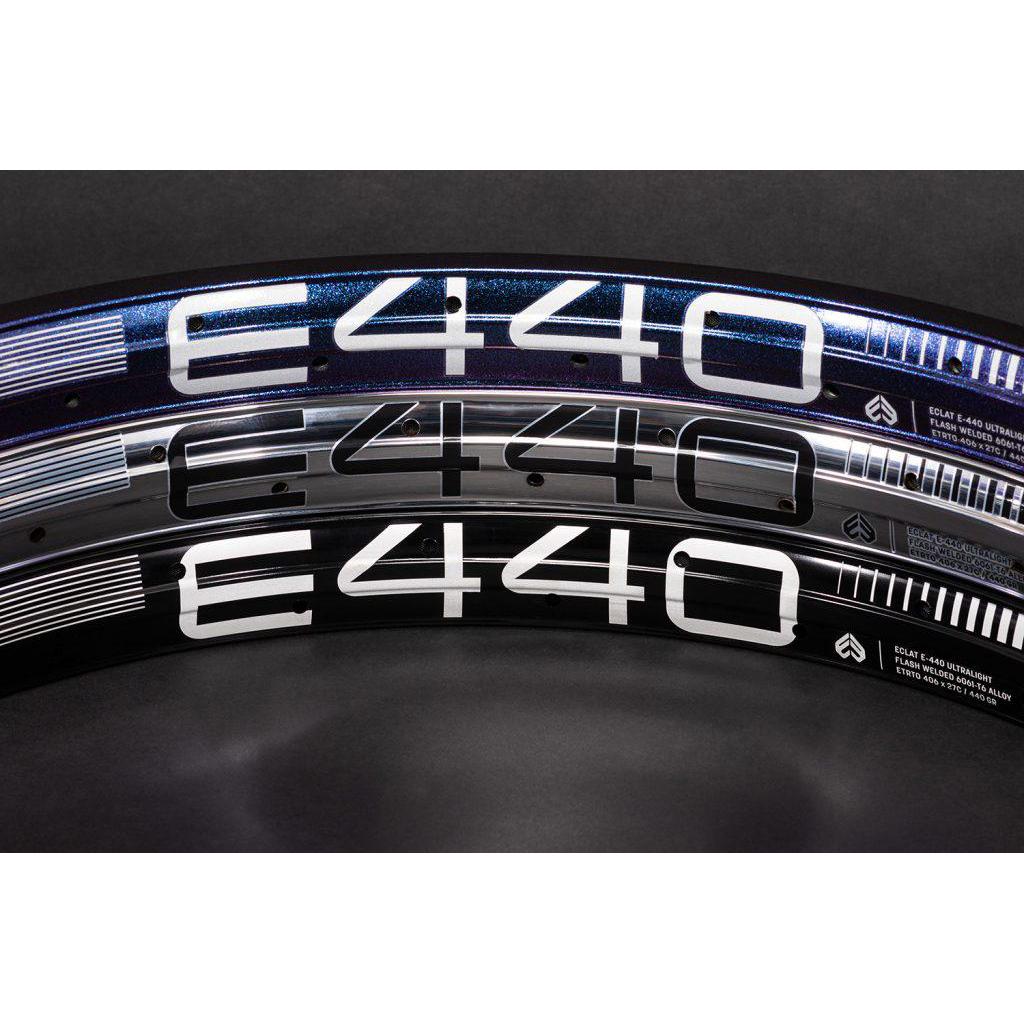 Three Eclat E440 Rim (36H) units, known for their lightweight build, stacked diagonally with bold white lettering on a dark background.