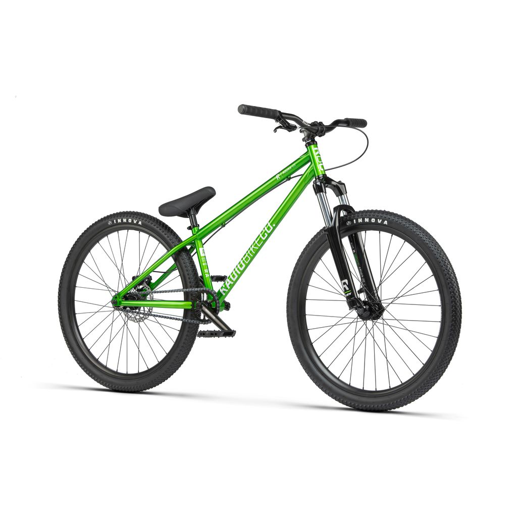 The Radio 26 Inch Asura Bike is a green dirt jump bicycle featuring a rugged chromoly steel frame and black tires. It comes with a single gear, a sturdy seat, and wide handlebars, making it perfect for all-terrain adventures.