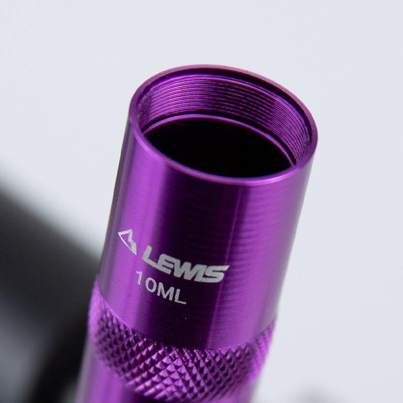 Close-up of a purple metal cylinder labeled "Lewis Portable Oil Funnel" with textured grip detail.