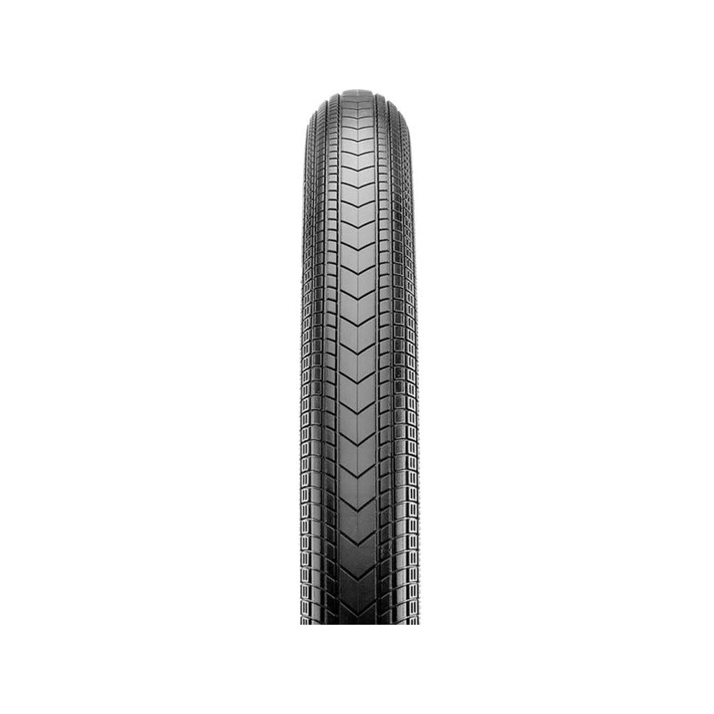 A close-up of a black CST Operative 20 Inch Tire highlights its textured, grooved tread for all-around performance and cornering grip, displayed vertically against a white background.