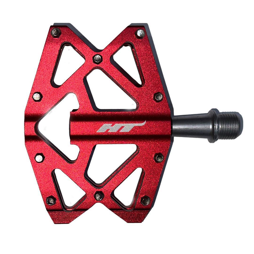 The HT AXO1A Nano Pedals are red aluminum bike pedals featuring a geometric design and metal spindle, ideal for those looking for lightweight options.