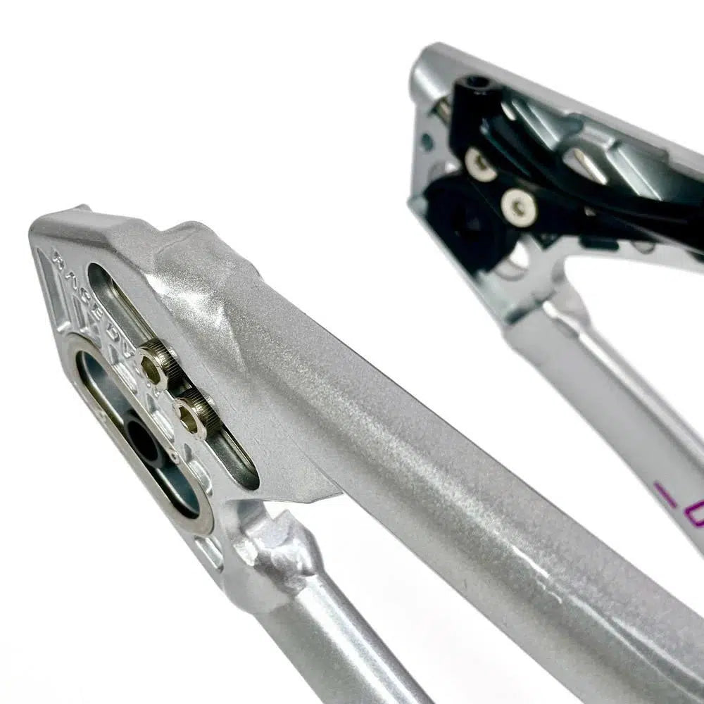 Close-up view of a metallic bicycle rear derailleur hanger and dropout on a Staystrong V5 Disc Pro XXXL Frame, showcasing the detailed machining and attachment points.