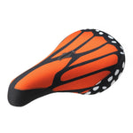 The Sunday Burn Slow Monarch Pivotal Seat features a bright orange and black butterfly wing pattern, accented with white spots and a discreet logo on top. Crafted in the unique Sunday saddle shape, it is part of the exclusive Sunday X Burn Slow collaboration collection.