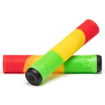 Two cylindrical ribbed grips made from super soft material, each with a black cap at both ends. One grip has red, yellow, and green sections; the other is solid green. Both Salt Plus XL Flangeless Grips are positioned against a white background, showcasing their increased length for added comfort.