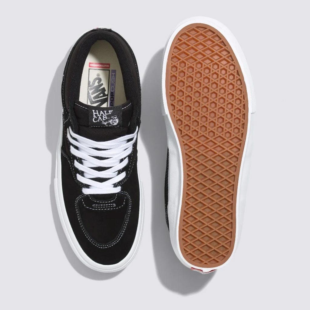 Half black half hot sale white vans