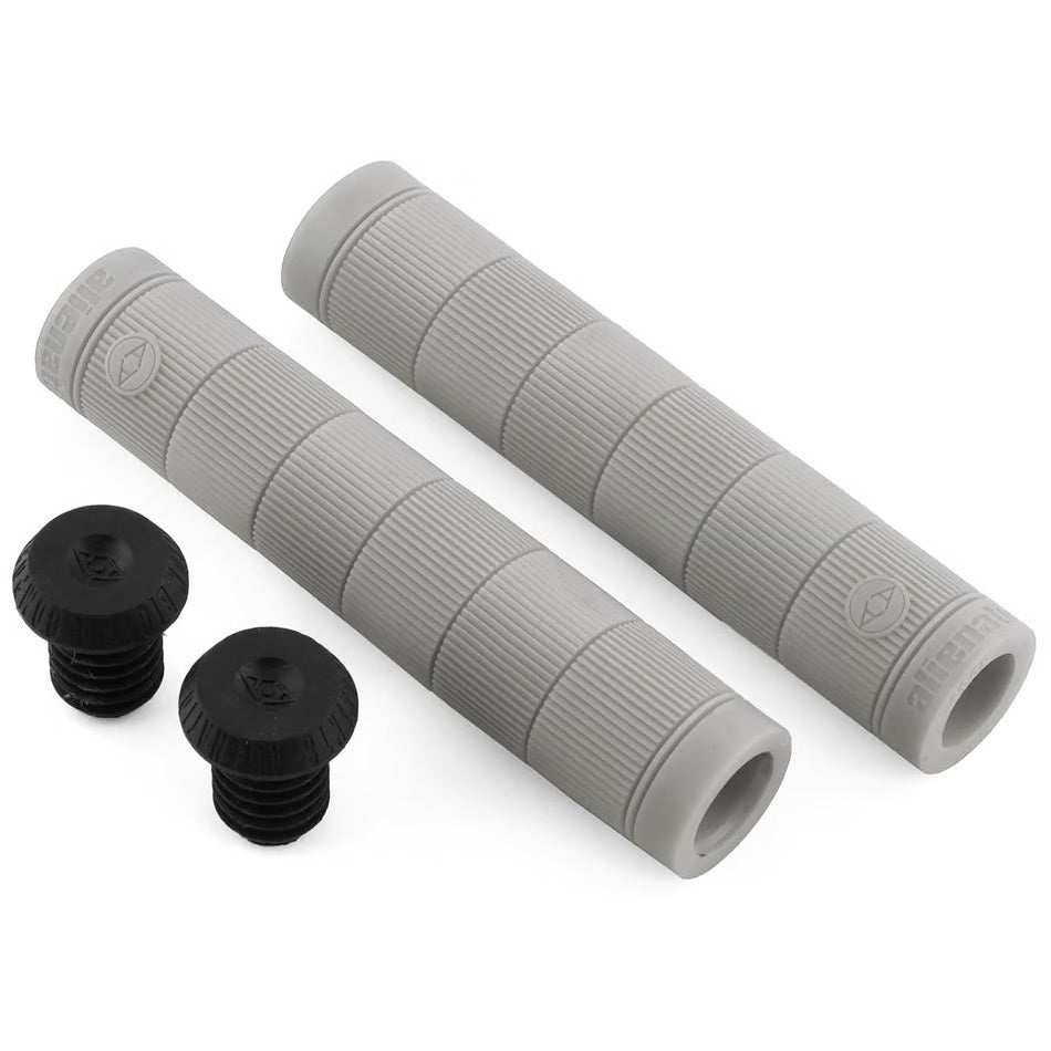 The Alienation Backlash V2 Grips set includes two gray cylindrical flangeless grips with ribbed texture and two black end caps, designed for enhanced durability and comfort using a proprietary rubber formula, all presented on a white background.