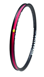 The Alienation Mischief G69 TCS 24 Inch Brakeless Rim features a black exterior adorned with "alienation" text and a vibrant red interior stripe, offering an angled view. Made from G69 material, this rim ensures durability and performance for dedicated cyclists.