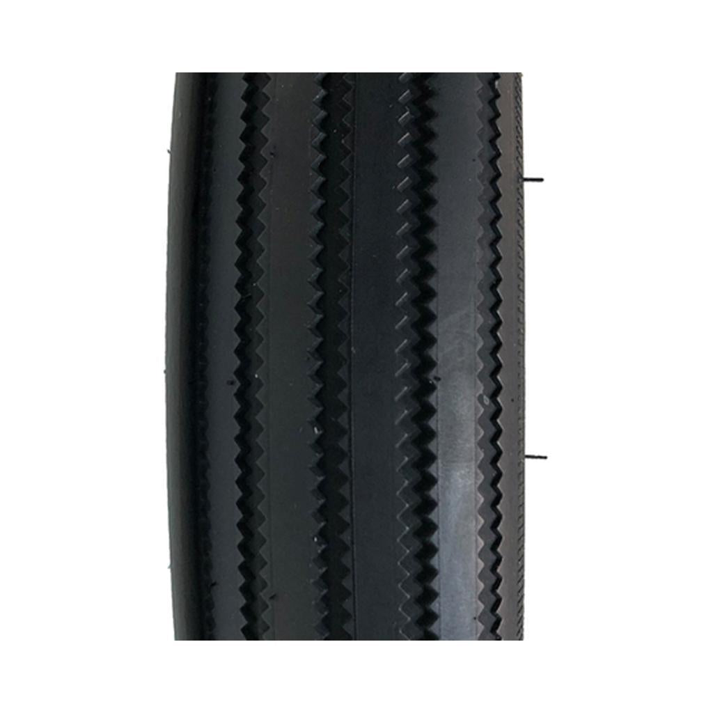 Close-up of the Alienation TCS Prowler Tyre in black, showcasing its zigzag tread pattern, small protruding rubber hairs, and improved grip due to its TCS design.