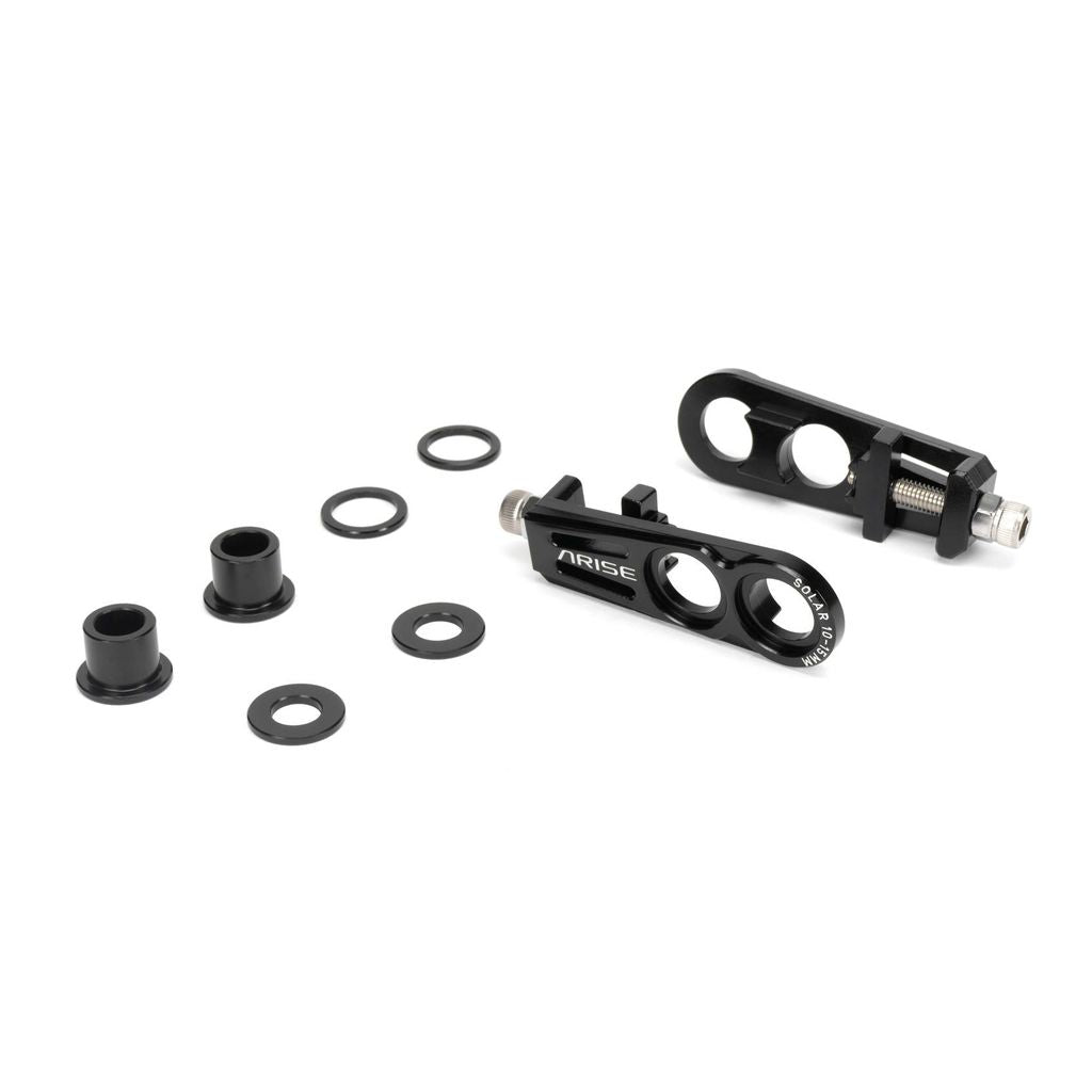 The Arise Solar Chain Tensioner (10/15mm) in black, featuring washers and bushings on a white background, exemplifies CNC alloy bike components.