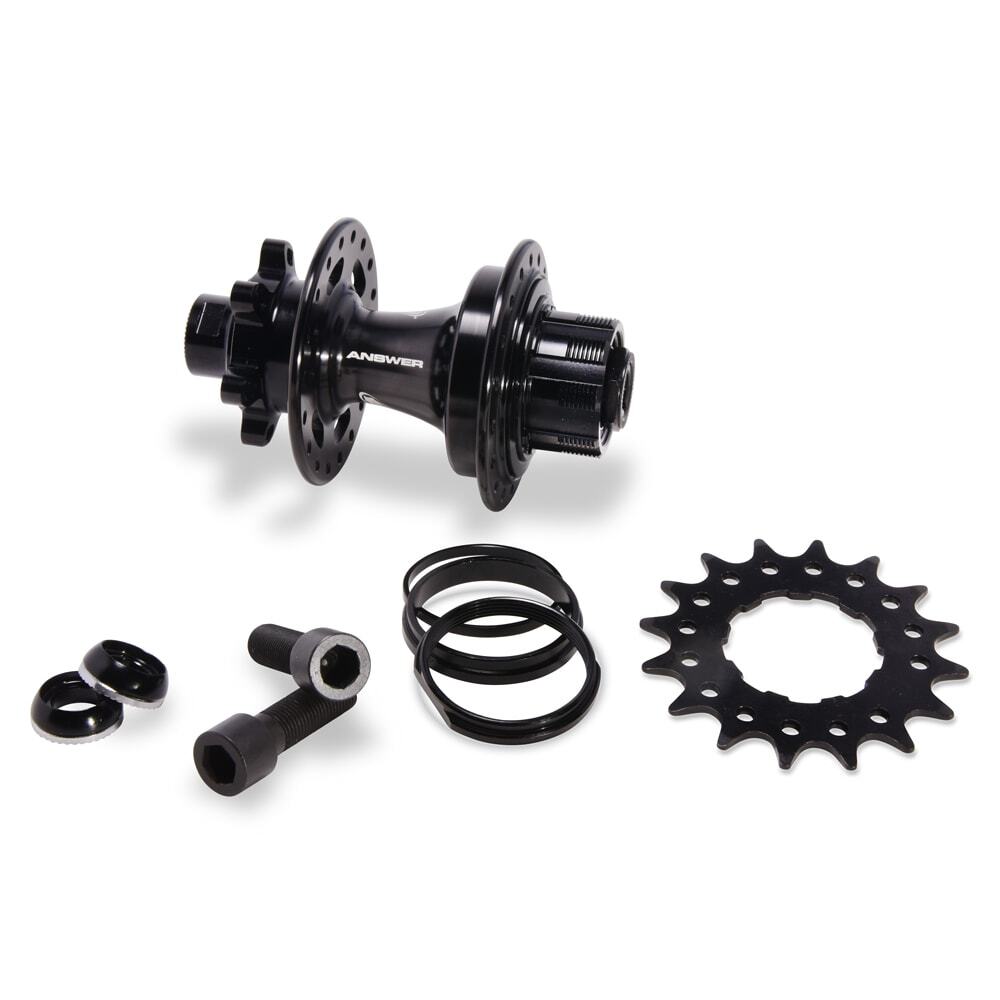 An Answer Rear Disc Expert Hub 28H in black, featuring a Shimano HG driver, along with axle bolts, spacers, and a sprocket are arranged on a white background.