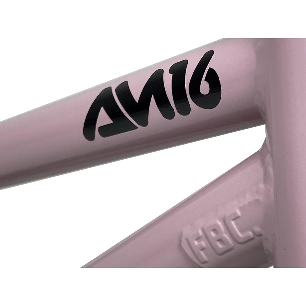 Close-up of a pink Fit Bike Co AM 16 Frame & Fork Kit with black "AN16" text and embossed "FBC" initials, ideal for young shredders.