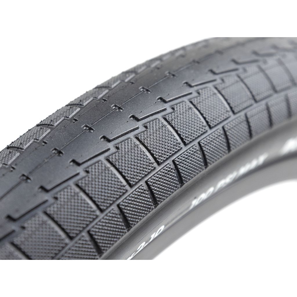 Close-up of an Odyssey Super Circuit Foldable Tyre featuring a textured tread pattern ideal for BMX racing.