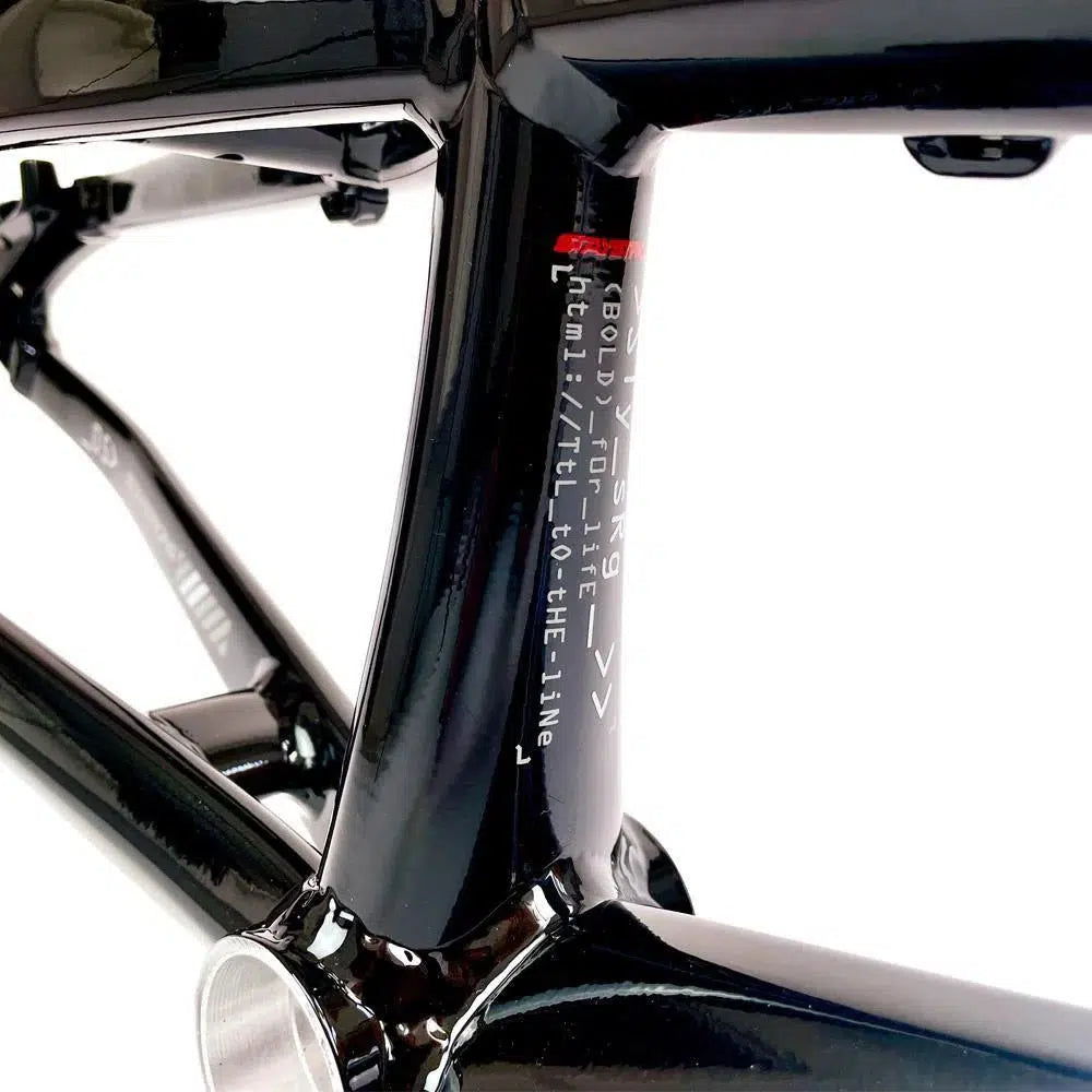 Close-up view of a black aluminium Staystrong V5 Disc Pro XXL Frame with white and red text on the tubing, featuring the bold "Stay Strong" logo.