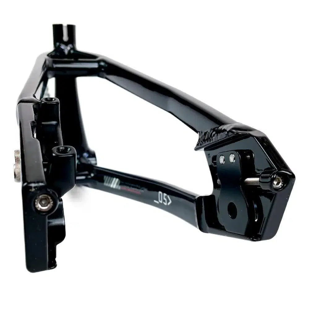 A black metal frame component with bolts and angle brackets, possibly used in mechanical or automotive assembly, reminiscent of the Staystrong V5 Disc Pro L Frame.