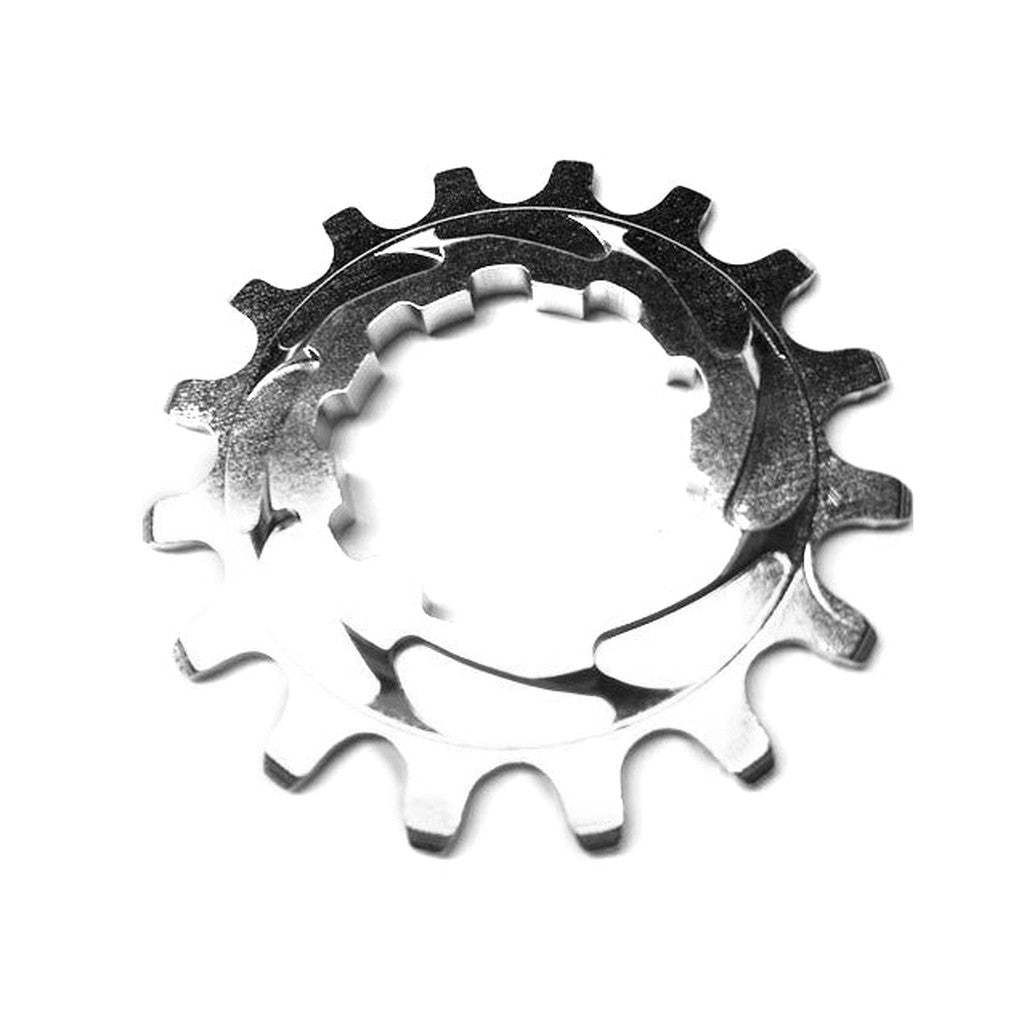 The Rennen Alloy Cog is a shiny metallic bicycle sprocket with 12 single speed specific tooth profiles, crafted from 7075-T6 Aluminium, set against a white background.