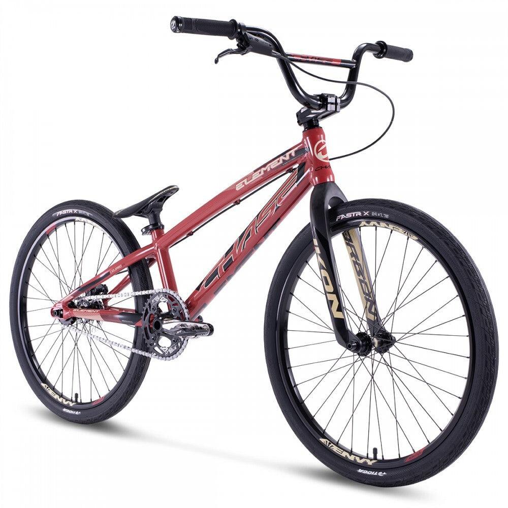 A Chase Element Pro Cruiser Bike featuring an Expert XL frame, lightweight design, knobby tires, and a single-gear drivetrain in a striking combination of red and black.