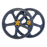 These Skyway Tuff II Rivet 20 Collector's Edition Wheels, featuring two black alloy wheels with five spokes each and striking orange hubs, are perfect for a retro BMX bike rebuild. The brand name "NOVA" is displayed near the edge, making any ride stand out.