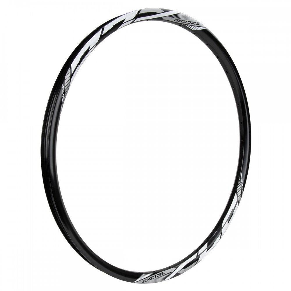 The Excess XLC Aluminium 451mm Rim boasts a sleek black and white design, expertly crafted with double-walled 6061 T6 alloy for enhanced durability. Its anodised finish adds a touch of sophistication when viewed from the side against the white background.