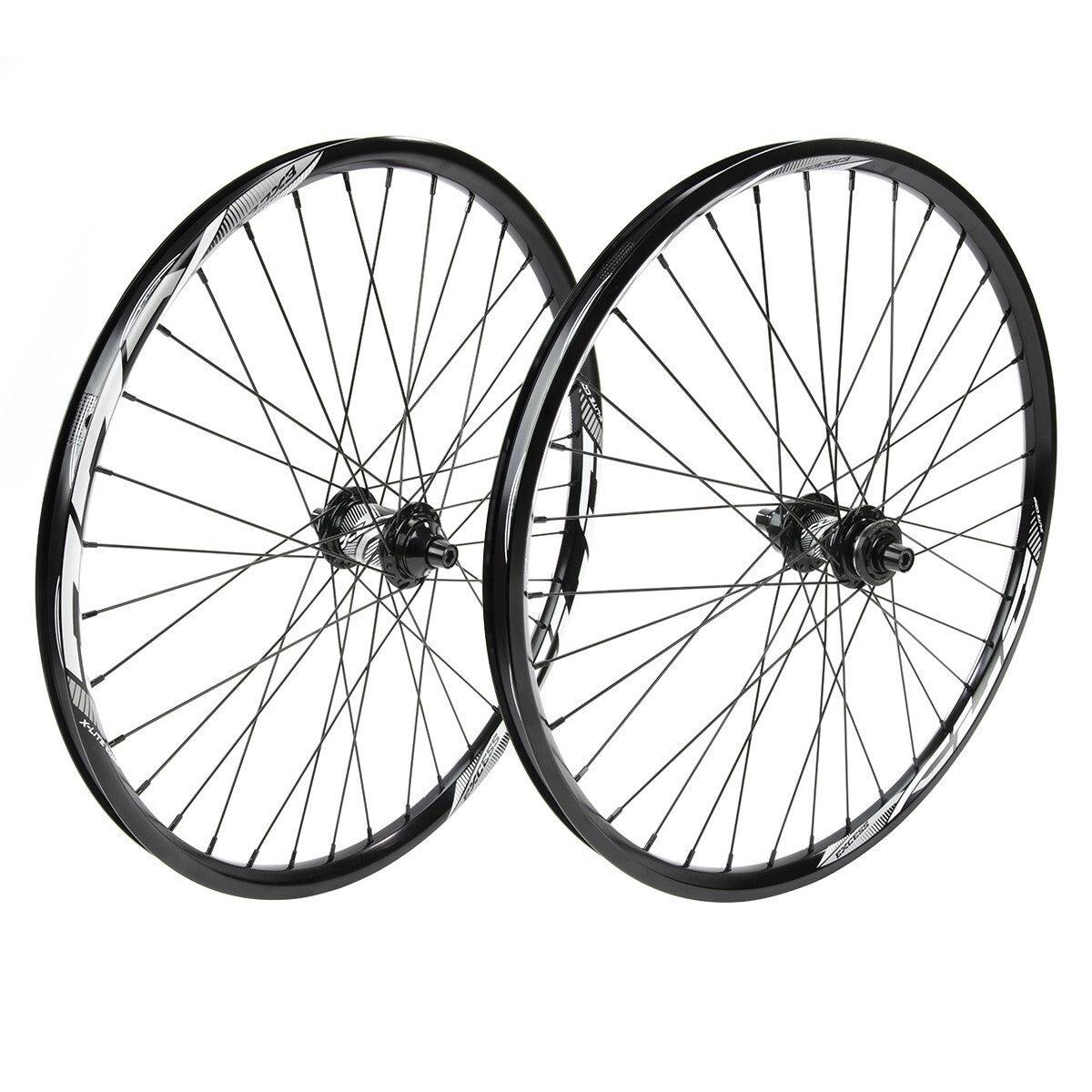 Two Excess XLC-1 Alloy Pro Cruiser Wheel Set wheels with spokes are standing upright next to each other against a white background.