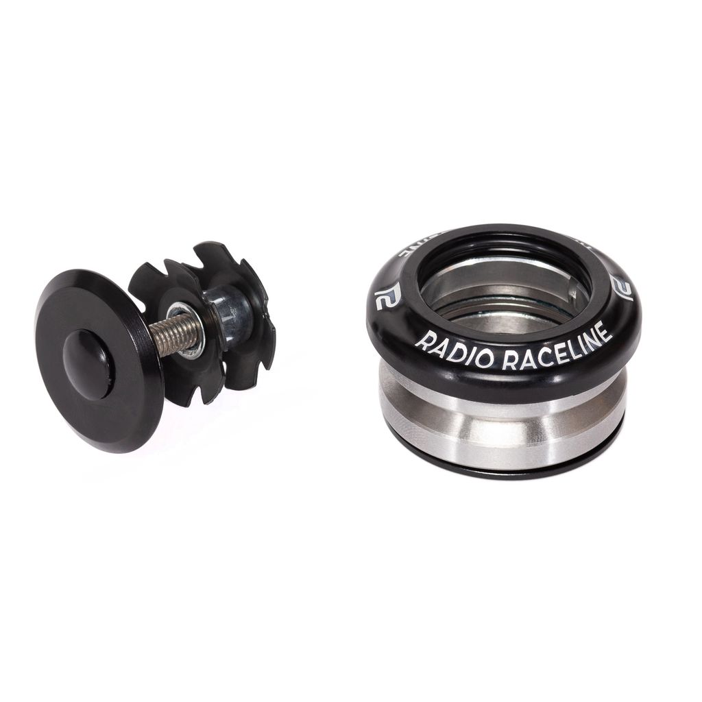 Bicycle headset assembly featuring a top cap with bolt and Radio Raceline 1-1/8 Inch Integrated Headset, equipped with high-precision bearings and a bearing race labeled "Radio Raceline." The lightweight CNC machined design ensures durability and optimal performance.