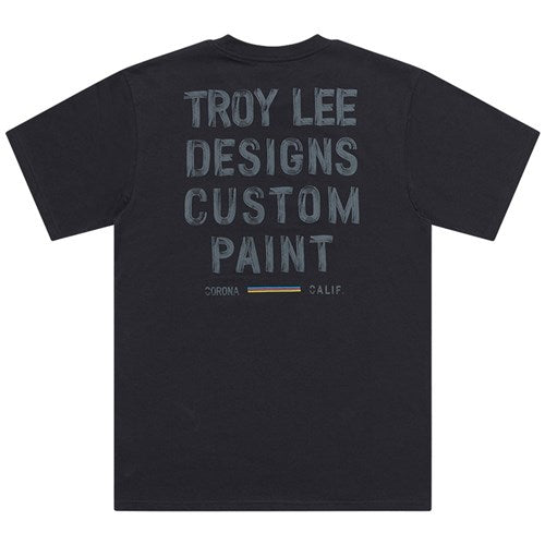 The TLD 25.1 Paint Shop SS T-Shirt is a black tee with "Troy Lee Designs Custom Paint, Corona, Calif." on the back in a simple font, ideal for shredding or chilling out.